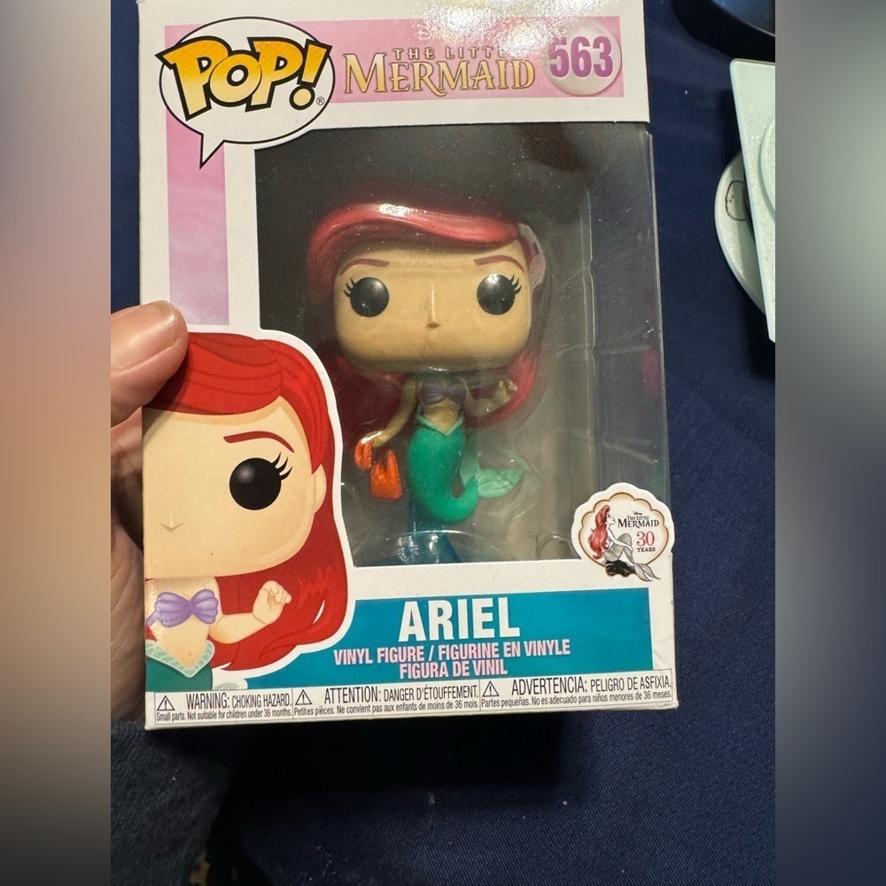 The Funko Pop! Disney The Little Mermaid Ariel with Bag Vinyl Figure #563 Mint